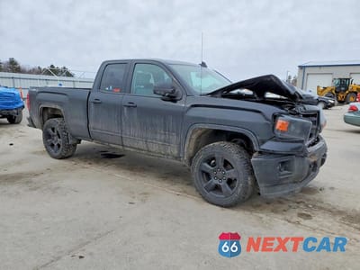 Czwarte zdjęcie samochodu z boku: 2015 GMC SIERRA K1500 VIN:1GTV2TEC5FZ327132 - miniatura