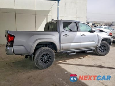 Trzecie zdjęcie samochodu z tyłu: 2022 TOYOTA TACOMA SR5 V6 VIN:3TMAZ5CN3NM167701 - miniatura