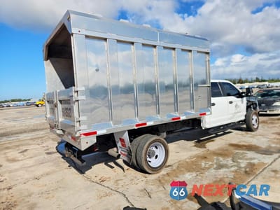 Czwarte zdjęcie samochodu z boku: 2022 FORD F450 SUPER DUTY VIN:1FD0W4GNXNEE93960 - miniatura