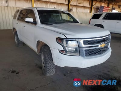Czwarte zdjęcie samochodu z boku: 2019 CHEVROLET TAHOE SPECIAL SERVICE 4WD VIN:1GNSKFEC7KR128752 - miniatura
