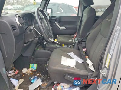 Zdjęcie 7 z 11 samochodu: 2017 JEEP WRANGLER UNLIMITED SAHARA VIN:1C4BJWEG3HL747651 - miniatura