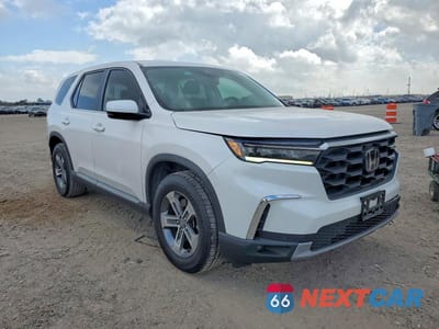 Czwarte zdjęcie samochodu z boku: 2023 HONDA PILOT EXL VIN:5FNYG2H58PB009969 - miniatura