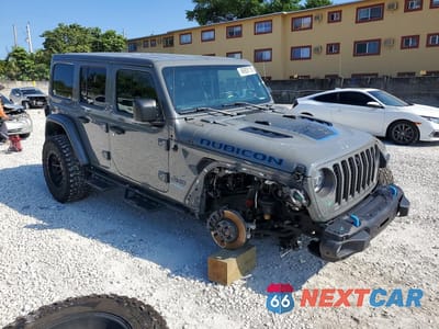 Czwarte zdjęcie samochodu z boku: 2021 JEEP WRANGLER UNLIMITED RUBICON 4XE VIN:1C4JJXR6XMW708129 - miniatura
