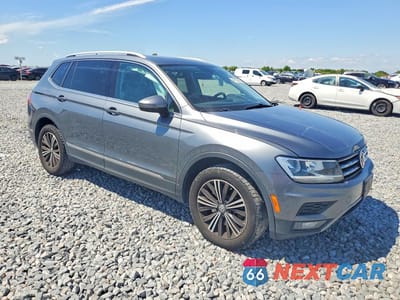 Czwarte zdjęcie samochodu z boku: 2018 VOLKSWAGEN TIGUAN SE VIN:3VV2B7AX5JM106368 - miniatura