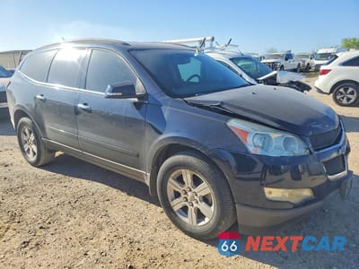 Czwarte zdjęcie samochodu z boku: 2011 CHEVROLET TRAVERSE LT VIN:1GNKRGED3BJ296820 - miniatura