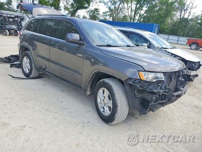 Czwarte zdjęcie samochodu z boku: 2017 JEEP GRAND CHEROKEE LAREDO VIN:1C4RJEAG2HC605807 - miniatura