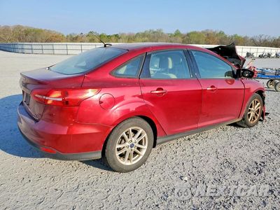 Trzecie zdjęcie samochodu z tyłu: 2016 FORD FOCUS SE VIN:1FADP3F2XGL287787 - miniatura