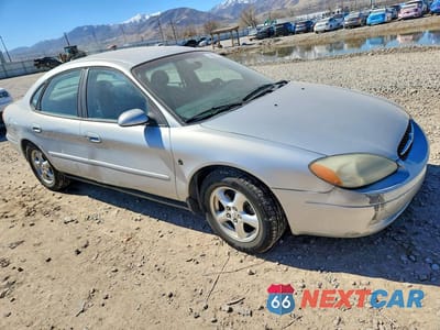 Czwarte zdjęcie samochodu z boku: 2002 FORD TAURUS SES VIN:1FAFP55272G244340 - miniatura