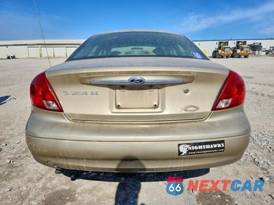Zdjęcie 6 z 12 samochodu: 2000 FORD TAURUS SE VIN:1FAFP5322YA218565 - miniatura