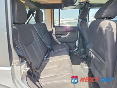 Zdjęcie 10 z 12 samochodu: 2015 JEEP WRANGLER UNLIMITED SAHARA VIN:1C4BJWEG9FL547435 - miniatura