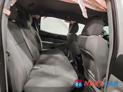 Zdjęcie 10 z 11 samochodu: 2013 TOYOTA TACOMA V6 VIN:5TFLU4EN2DX077091 - miniatura