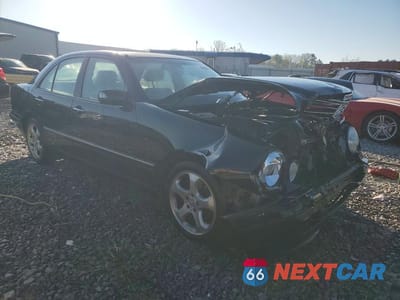 Czwarte zdjęcie samochodu z boku: 2002 MERCEDES-BENZ E 430 VIN:WDBJF70J22B481959 - miniatura