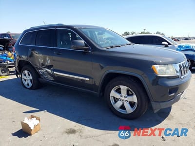 Czwarte zdjęcie samochodu z boku: 2011 JEEP GRAND CHEROKEE LAREDO VIN:1J4RS4GGXBC719702 - miniatura