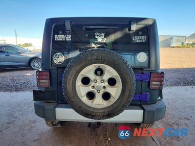 Zdjęcie 6 z 11 samochodu: 2014 JEEP WRANGLER UNLIMITED SAHARA VIN:1C4BJWEG1EL175250 - miniatura