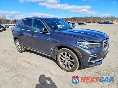 Czwarte zdjęcie samochodu z boku: 2021 BMW X5 XDRIVE40I VIN:5UXCR6C07M9G14001 - miniatura