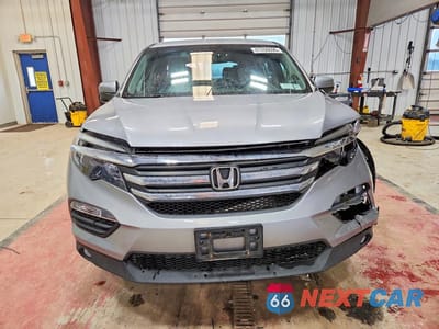 Piąte zdjęcie samochodu w środku: 2018 HONDA PILOT EX VIN:5FNYF6H30JB036874 - miniatura