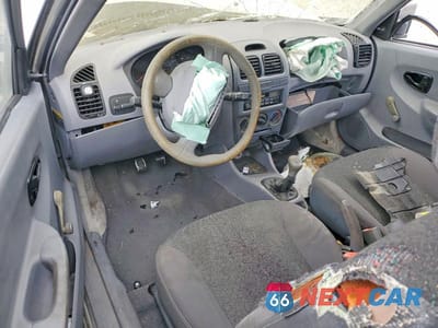 Zdjęcie 8 z 11 samochodu: 2004 HYUNDAI ACCENT BASE VIN:KMHCF35C54U299849 - miniatura