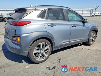 Trzecie zdjęcie samochodu z tyłu: 2021 HYUNDAI KONA LIMITED VIN:KM8K33A52MU608298 - miniatura