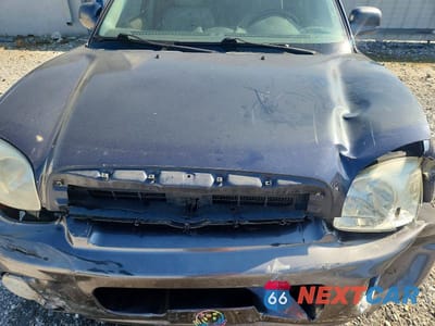 Zdjęcie 12 z 13 samochodu: 2006 HYUNDAI SANTA FE GLS VIN:KM8SC13DX6U101340 - miniatura