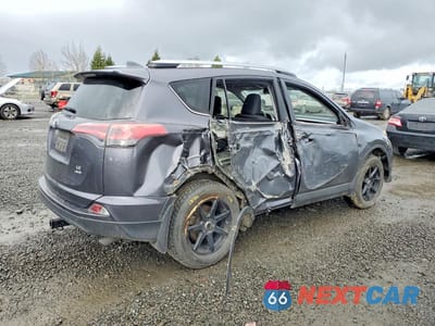 Trzecie zdjęcie samochodu z tyłu: 2018 TOYOTA RAV4 LE VIN:JTMBFREV2JJ221661 - miniatura