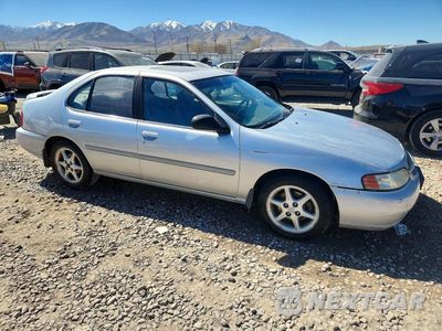 Czwarte zdjęcie samochodu z boku: 2000 NISSAN ALTIMA XE/GXE/SE/GLE VIN:1N4DL01D4YC245376 - miniatura