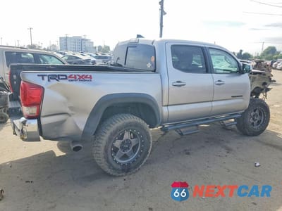 Trzecie zdjęcie samochodu z tyłu: 2017 TOYOTA TACOMA TRD OFF-ROAD VIN:3TMCZ5AN0HM090740 - miniatura