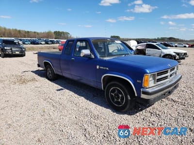 Czwarte zdjęcie samochodu z boku: 1990 DODGE DAKOTA VIN:1B7FL23X8LS691812 - miniatura