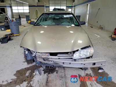 Piąte zdjęcie samochodu w środku: 1998 PONTIAC GRAND AM SE VIN:1G2NE52T9WM500188 - miniatura