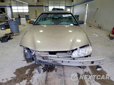 Piąte zdjęcie samochodu w środku: 1998 PONTIAC GRAND AM SE VIN:1G2NE52T9WM500188 - miniatura