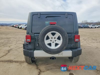 Zdjęcie 6 z 12 samochodu: 2012 JEEP WRANGLER UNLIMITED SAHARA VIN:1C4HJWEG2CL240954 - miniatura