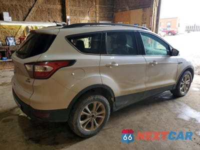Trzecie zdjęcie samochodu z tyłu: 2017 FORD ESCAPE SE VIN:1FMCU9G96HUA23082 - miniatura