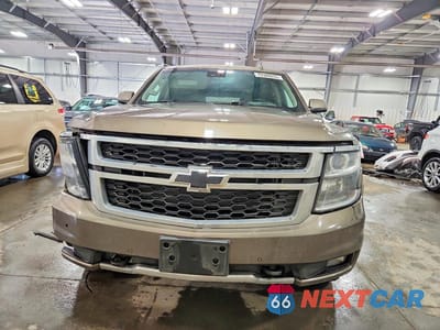 Piąte zdjęcie samochodu w środku: 2016 CHEVROLET SUBURBAN K1500 LT VIN:1GNSKHKC3GR430952 - miniatura
