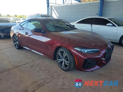 Czwarte zdjęcie samochodu z boku: 2022 BMW M440I VIN:WBA83AP04NCJ33076 - miniatura