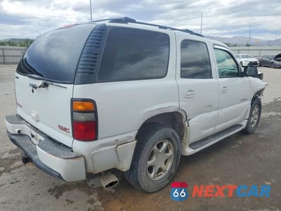 Trzecie zdjęcie samochodu z tyłu: 2004 GMC YUKON DENALI VIN:1GKEK63U34J267056 - miniatura