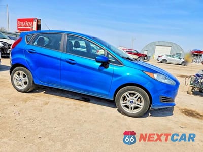 Czwarte zdjęcie samochodu z boku: 2017 FORD FIESTA SE VIN:3FADP4EJ6HM138405 - miniatura
