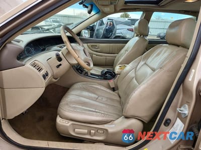 Zdjęcie 7 z 12 samochodu: 2000 TOYOTA AVALON XLS VIN:4T1BF28B9YU108156 - miniatura