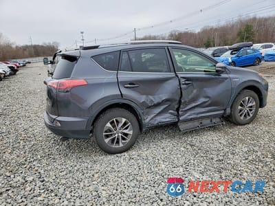 Trzecie zdjęcie samochodu z tyłu: 2017 TOYOTA RAV4 HYBRID XLE VIN:JTMRJREV9HD135012 - miniatura