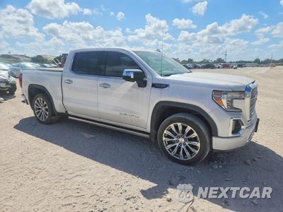 Czwarte zdjęcie samochodu z boku: 2020 GMC SIERRA K1500 DENALI VIN:3GTU9FEL7LG404331 - miniatura
