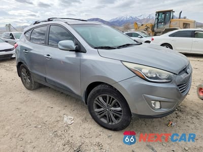 Czwarte zdjęcie samochodu z boku: 2014 HYUNDAI TUCSON SE VIN:KM8JUCAG4EU895722 - miniatura