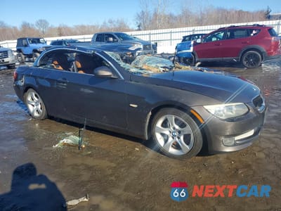 Czwarte zdjęcie samochodu z boku: 2011 BMW 335 I VIN:WBADX7C56BE742869 - miniatura