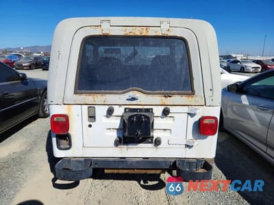 Zdjęcie 6 z 12 samochodu: 1990 JEEP WRANGLER VIN:2J4FY29T3LJ505562 - miniatura