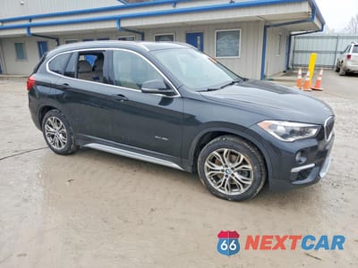 Czwarte zdjęcie samochodu z boku: 2017 BMW X1 XDRIVE28I VIN:WBXHT3Z36H4A54664 - miniatura