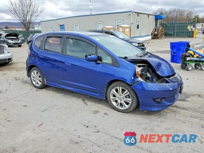 Czwarte zdjęcie samochodu z boku: 2010 HONDA FIT SPORT VIN:JHMGE8H43AC000742 - miniatura