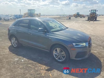 Czwarte zdjęcie samochodu z boku: 2018 AUDI Q3 PREMIUM VIN:WA1BCCFS4JR010998 - miniatura