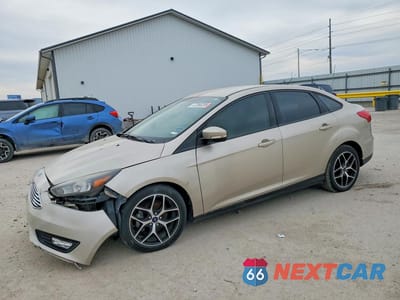 2017 FORD FOCUS SE 1FADP3FE6HL292903 - główne zdjęcie licytacji z USA - miniatura