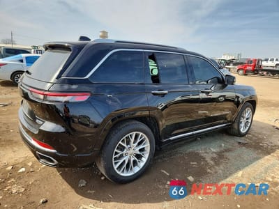 Trzecie zdjęcie samochodu z tyłu: 2023 JEEP GRAND CHEROKEE SUMMIT VIN:1C4RJHEG9PC575246 - miniatura