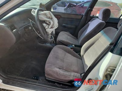 Zdjęcie 7 z 12 samochodu: 1995 TOYOTA COROLLA DX VIN:1NXAE09B7SZ316433 - miniatura