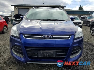 Piąte zdjęcie samochodu w środku: 2016 FORD ESCAPE TITANIUM VIN:1FMCU0J9XGUB73280 - miniatura