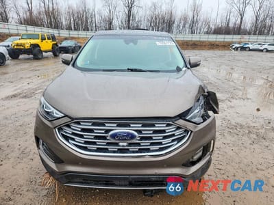 Piąte zdjęcie samochodu w środku: 2019 FORD EDGE TITANIUM VIN:2FMPK4K96KBB74972 - miniatura