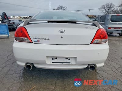 Zdjęcie 6 z 11 samochodu: 2005 HYUNDAI TIBURON GS VIN:KMHHM65DX5U174840 - miniatura